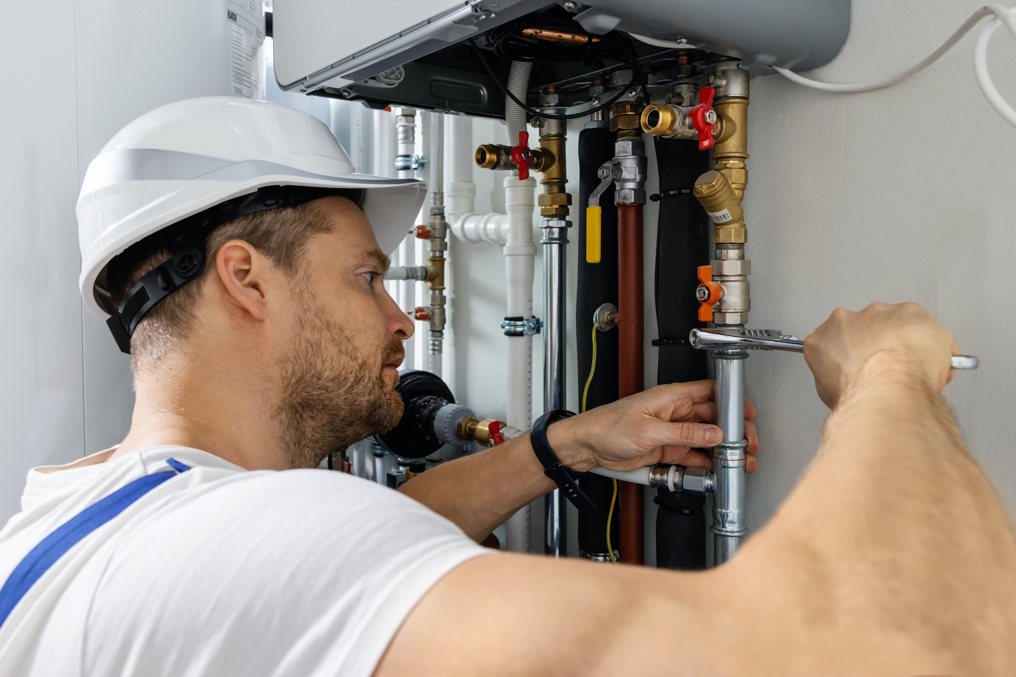 Worker Installing Pipes