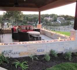 A Cozy Patio Featuring A Fire Pit